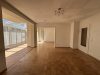 Wohnzimmer mit Wintergarten (EG Wohnung)