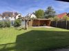 Garten mit überdachtem Freisitz